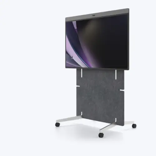 Neat Board Pro 65-inch all-in-one video conferencing touchscreen on a floor stand in a Pakistani boardroom, deployed by Capstar Solutions