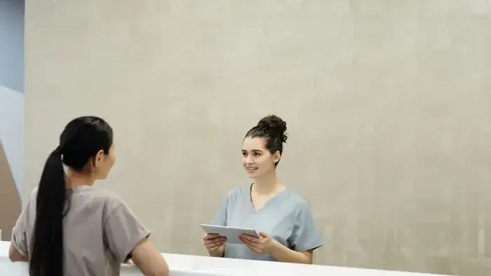 healthcare reception patient enquiry 700x394 1