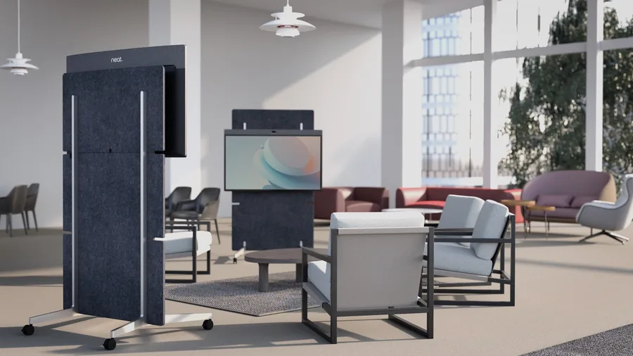 Neat Board Pro mounted on a mobile floor stand in a modern lounge-style meeting space